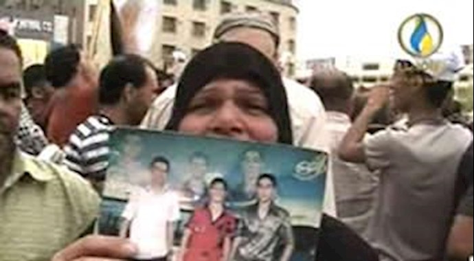 اعتراض یکی از مادران به مالکی در میدان تحریر بغداد