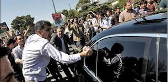 تجمع اعتراضی باندهای رقیب علیه حسن روحاني هنگام بازگشت وی به تهران
