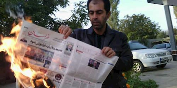 آتش زدن روزنامه حکومتی خراسان توسط یک معلم شریف