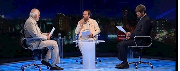 احمد توکلی و علی مطهری  در یک برنامه تلویزیونی 