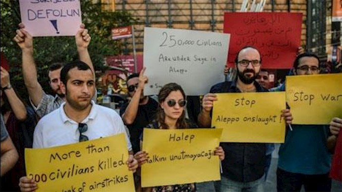 کشتار حلب را متوقف کنید امروز شماری از سوری‌ها و ترکیه‌ای ها در اعتراض