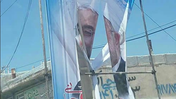 پاره کردن بنر  روحانی