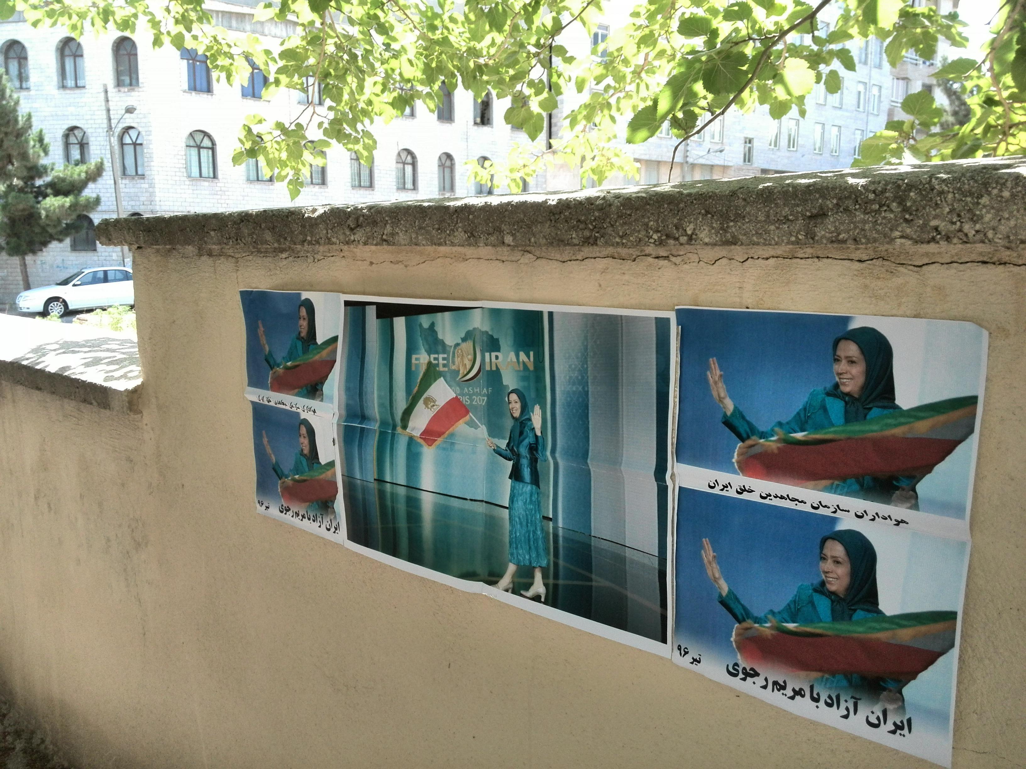 تهران: خیابان همیشه بهار - نصب تصاویر مریم رجوی