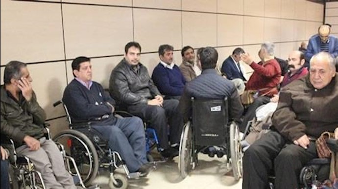 تجمع اعتراضی مجروحان جنگ ضدمیهنی در مقابل سازمان مدیریت و برنامه‌ریزی