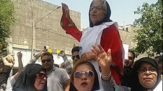 تجمع اعتراضی غارت شدگان مؤسسه کاسپین در مشهد کفن پوشان   در مشهد