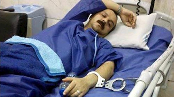 زندانی سیاسی رضا شهابی در اعتصاب غدا با دستان بسته 