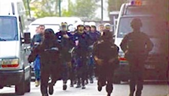 نیروهای فرانسوی در حال تهاجم به دفتر مرکزی شورای ملی مقاومت ایران در حومه پاریس