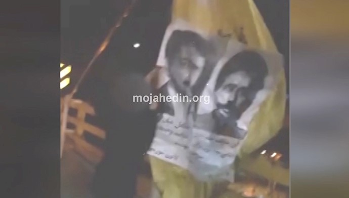  بر افراشتن بنر بزرگ ستارخان و مسعود رجوی توسط کانونهای شورشی بر پل ورودی تبریز