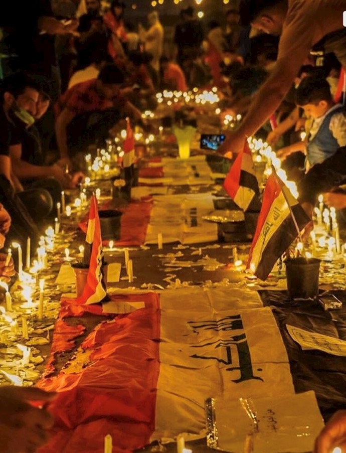 میدان تحریر - یاد شهیدان با روشن کردن شمع و سوگند گرفتن انتقام خون آنها