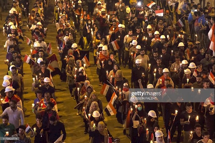 میدان تحریر بغداد - مراسم و روشن کردن شمع برای شهیدان قیام عراق - ۱۴آبان۹۸