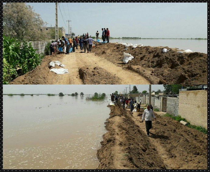 تلاش جوانان برای ایجاد سیل بند در روستای سید عباس شوش