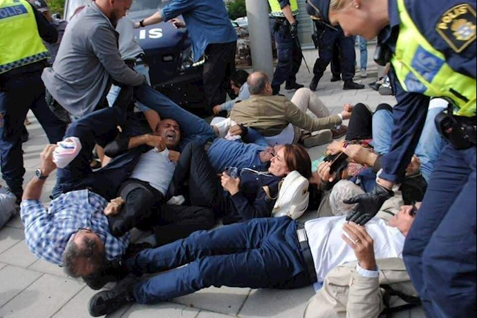 اعتراض هموطنان و یاران اشرف‌نشان علیه حضور جواد ظریف در سوئد