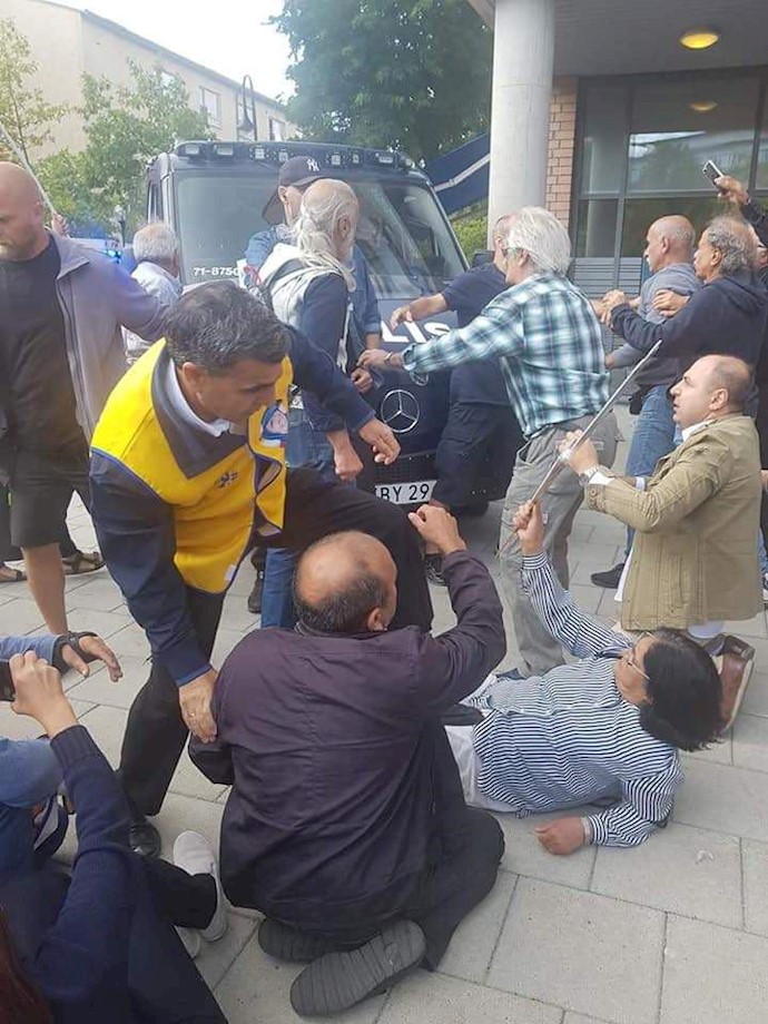 اعتراض هموطنان و یاران اشرف‌نشان علیه حضور جواد ظریف در سوئد