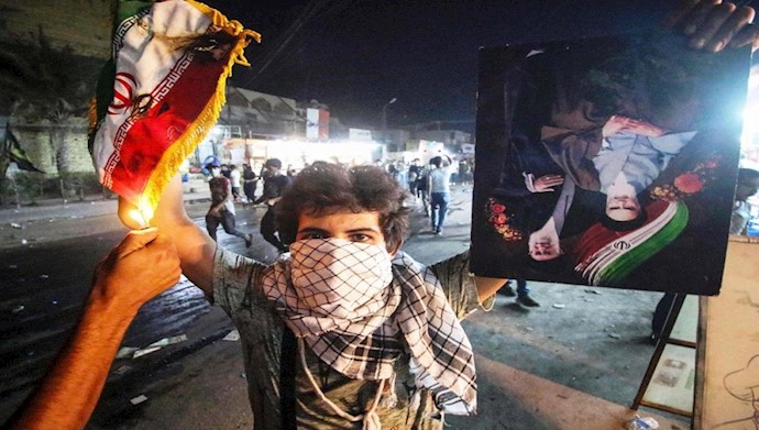 آتش زدن عکس خامنه ای توسط جوانان شورشی