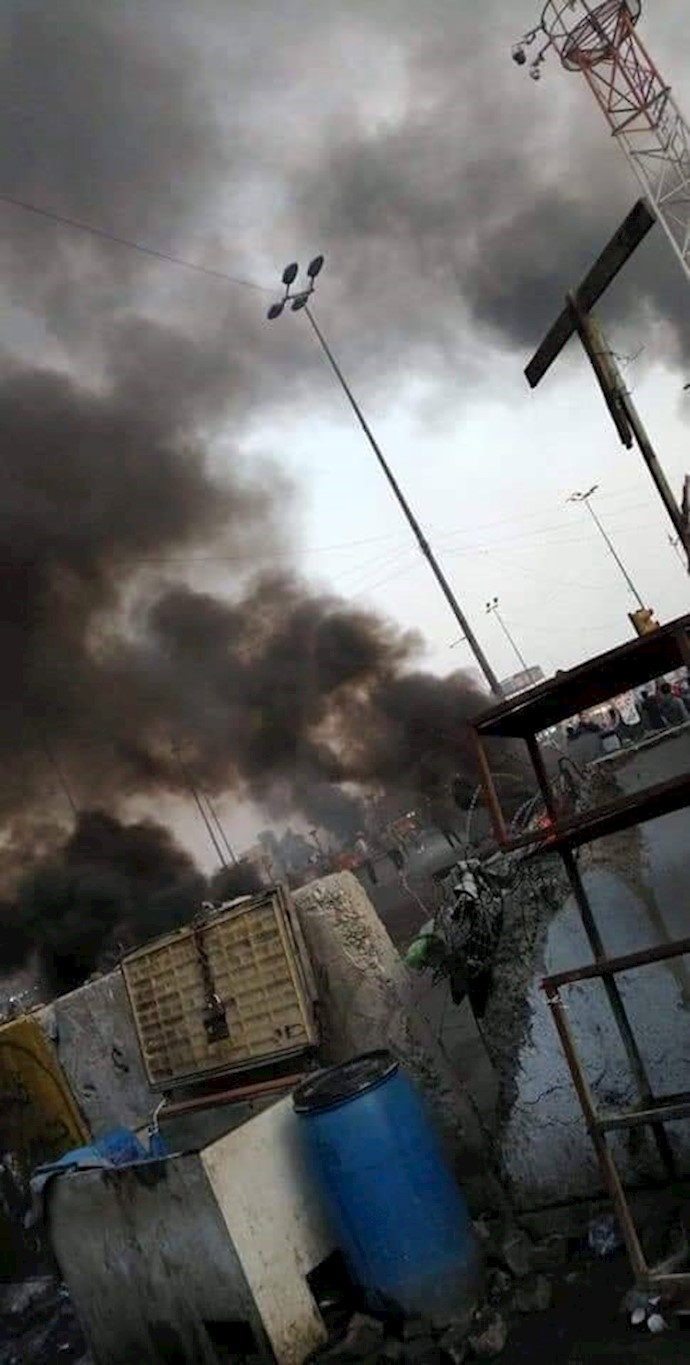بغداد - درگیری شبه‌نظامیان با مردم و جوانان در میدان الطیران والکیلانی