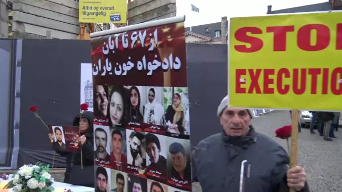 گرامی‌داشت و همبستگی با قیام آبان ۹۸ و فراخوان به محاکمه خامنه‌ای و رئیسی جلاد در کپنهاک دانمارک - 4