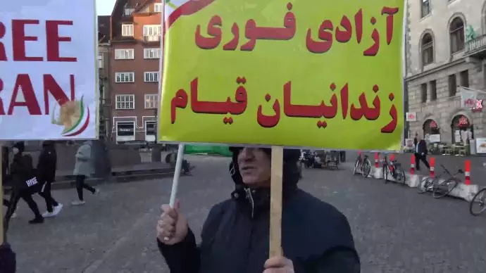 گرامی‌داشت و همبستگی با قیام آبان ۹۸ و فراخوان به محاکمه خامنه‌ای و رئیسی جلاد در کپنهاک دانمارک - 5