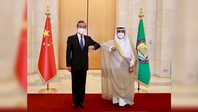 نایف بن فلاح مبارک الحجرف -  وانگ یی وزیر خارجه چین