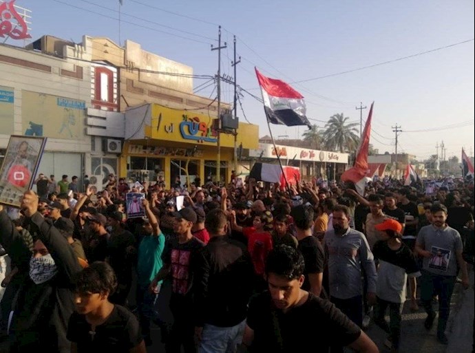 تظاهرات مردم و جوانان کربلا در تشییع پیکر ایهاب الوزنی از فعالان عراق - 1