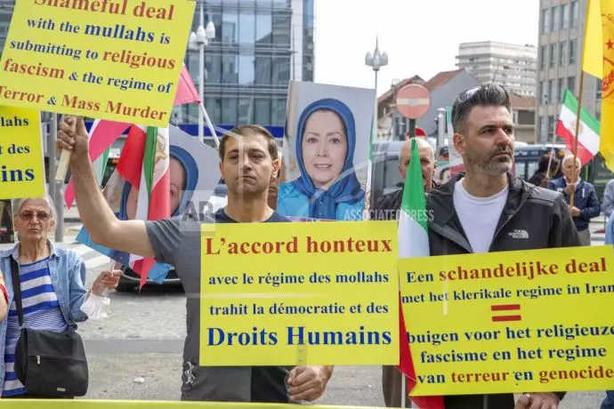 انعکاس تصویری آسوشیتدپرس از تظاهرات ایرانیان آزاده و اشرف‌نشانها در برابر پارلمان بروکسل - 10