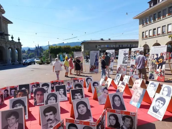 -برگزاری نمایشگاه قتل‌عام شدگان سال ۶۷ در برن سوئیس علیه آخوند رئیسی - ۳شهریورماه - 3