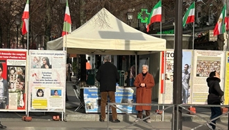 پاریس - برگزاری میز کتاب و نمایشگاه تصاویر شهیدان در همبستگی با قیام سراسری - ۶آذر