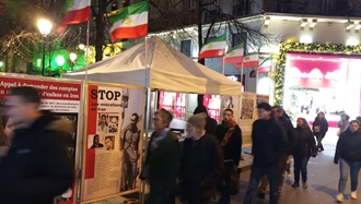 پاریس - برگزاری میز کتاب و نمایش تصاویر شهیدان، در همبستگی با قیام سراسری - ۹دی 
