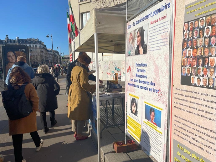 پاریس - برگزاری میز کتاب و نمایش تصاویر شهیدان، در همبستگی با قیام سراسری - ۲۵آذر