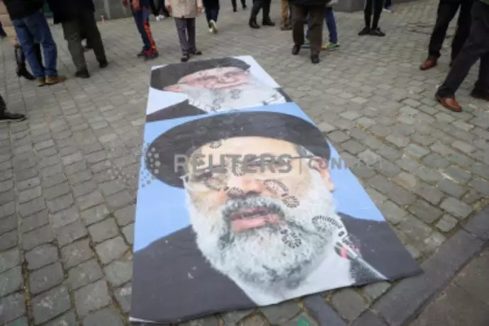 انعکاس تصویری رویترز از تظاهرات هواداران مجاهدین و شورای ملی مقاومت ایران در بروکسل - 8