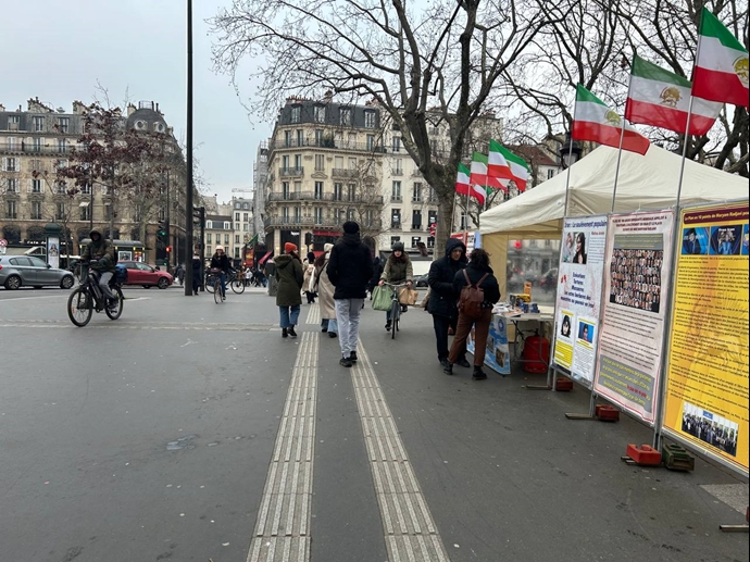 پاریس - برگزاری میز کتاب و نمایش تصاویر شهیدان قیام در همبستگی با قیام سراسری - ۲۳دی