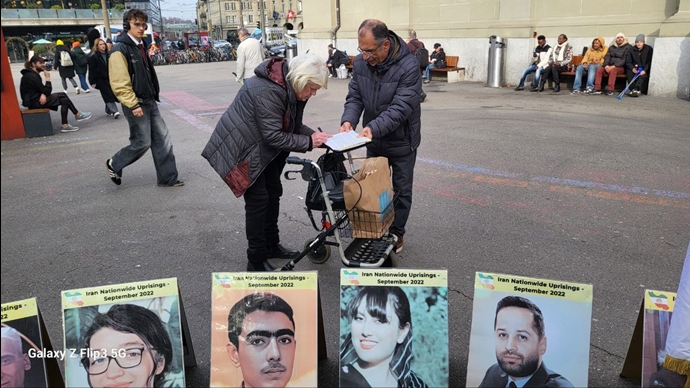 برن سوئیس - برگزاری میز کتاب و اعتراض به اعدامهای گسترده توسط رژیم آخوندی توسط ایرانیان آزاده - ۱۰بهمن