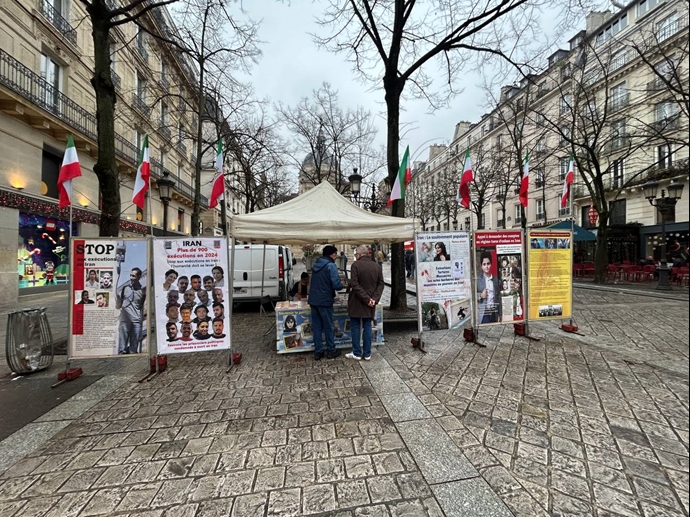 پاریس - برگزاری میز کتاب و نمایش تصاویر شهیدان قیام سراسری توسط ایرانیان آزاده - ۴دی ۱۴۰۳۳