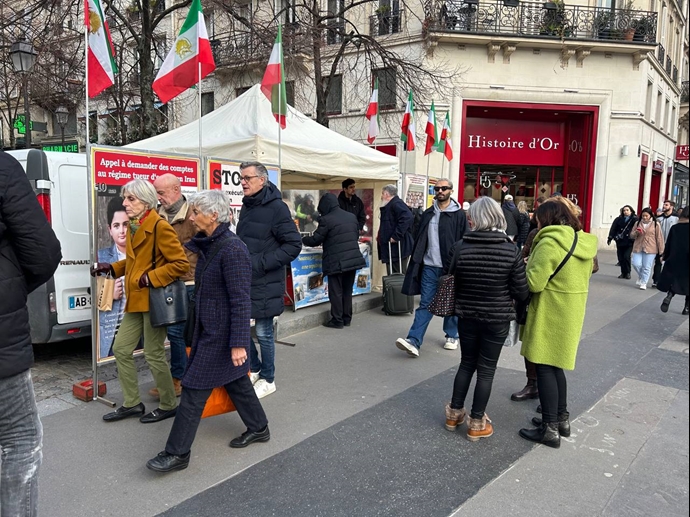 پاریس - برگزاری میز کتاب و نمایش تصاویر شهیدان در همبستگی با قیام سراسری - ۱۳بهمن