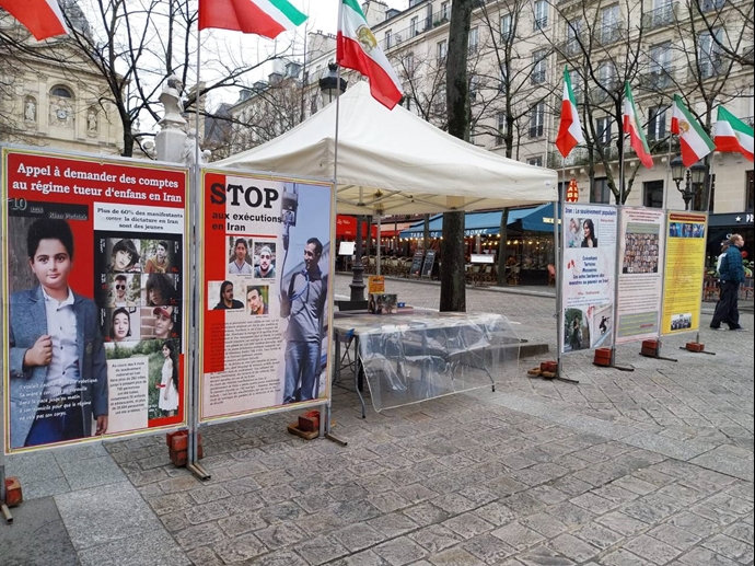 پاریس - برگزاری میز کتاب و نمایش تصاویر شهیدان قیام در همبستگی با قیام سراسری - ۲۴بهمن