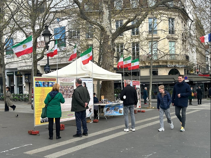 پاریس - برگزاری میز کتاب و نمایش تصاویر شهیدان توسط ایرانیان آزاده و در همبستگی با قیام سراسری - ۱۰فروردین