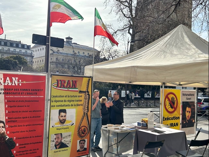 پاریس - برگزاری میز کتاب و نمایش تصاویر شهیدان، در همبستگی با قیام سراسری - ۲۴اسفند