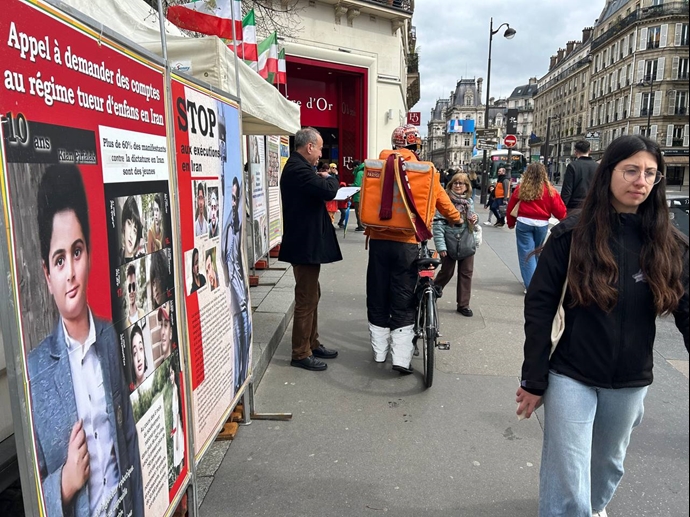 پاریس - برگزاری میز کتاب و نمایش تصاویر شهیدان توسط ایرانیان آزاده و در همبستگی با قیام سراسری - ۱۱فروردین