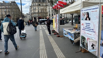 پاریس - برگزاری میز کتاب و نمایش تصاویر شهیدان در همبستگی با قیام سراسری - ۸فروردین