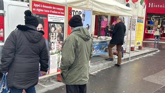 پاریس - برگزاری میز کتاب و نمایش تصاویر شهیدان