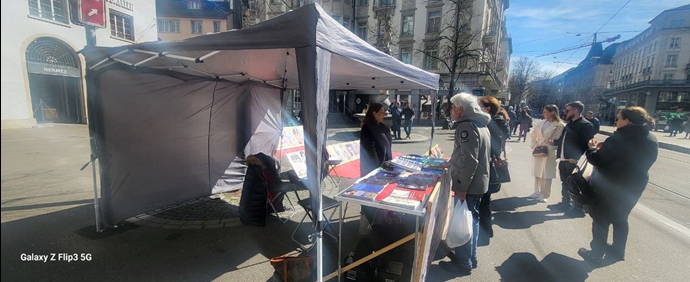زوریخ - برگزاری نمایشگاه عکس شهیدان و میز کتاب در همبستگی با قیام سراسری - ۶فروردین