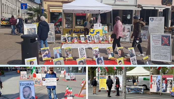  پاریس، اشپایر و برلین - برگزاری میز کتاب و نمایش تصاویر شهیدان توسط ایرانیان آزاده در همبستگی با قیام سراسری