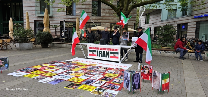 مونستر آلمان - برگزاری میز کتاب در اعتراض به اعدامهای جنایتکارانه خامنه‌ای توسط ایرانیان آزاده - ۱۴اردیبهشت