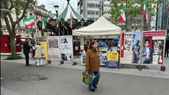 پاریس - برگزاری میز کتاب و نمایش تصاویر شهیدان توسط ایرانیان آزاده