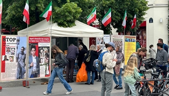 برگزاری میز کتاب و نمایش تصاویر شهیدان توسط ایرانیان آزاده و در همبستگی با قیام سراسری در پاریس