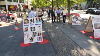 برلین - برگزاری میز کتاب و نمایش تصاویر شهیدان