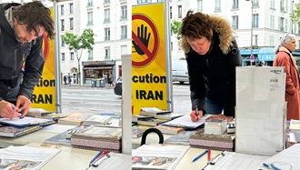 برگزاری میز کتاب و نمایش تصاویر شهیدان در همبستگی با قیام سراسری توسط ایرانیان آزاده در پاریس