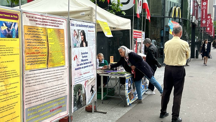 برگزاری میز کتاب و نمایش تصاویر شهیدان در همبستگی با قیام سراسری مردم ایران در پاریس