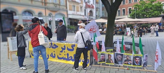 آخن آلمان - برگزاری میز کتاب و نمایش تصاویر شهیدان در همبستگی با قیام سراسری توسط ایرانیان آزاده - ۲۹اردیبهشت