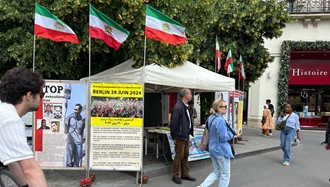 پاریس - برگزاری میز کتاب و نمایش تصاویر شهیدان در همبستگی با قیام سراسری توسط ایرانیان آزاده 