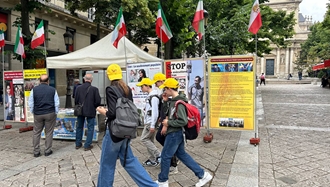 برگزاری میز کتاب و نمایش تصاویر شهیدان در همبستگی با قیام سراسری توسط ایرانیان آزاده در پاریس